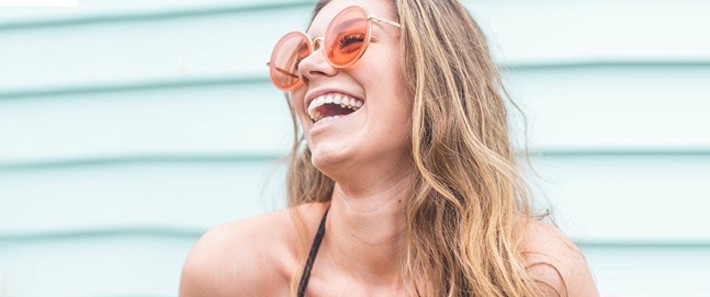 A woman smiling