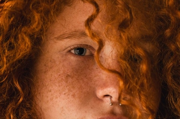 Woman with freckles on her face 