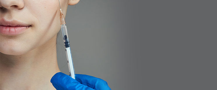 A woman with a Botox applicator