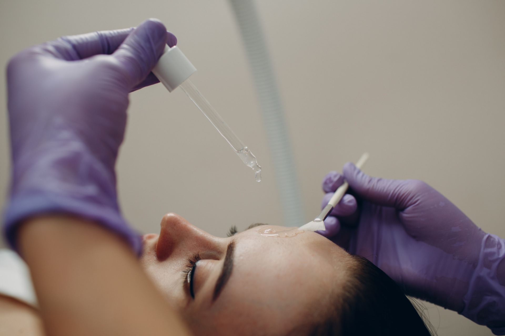 a woman receiving a retinol treatment at a med spa