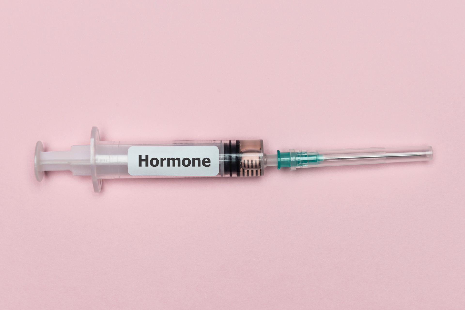  A needle with the word ‘hormone’ written on its casing
