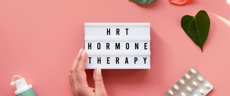 A sign that says “HRT hormone therapy”