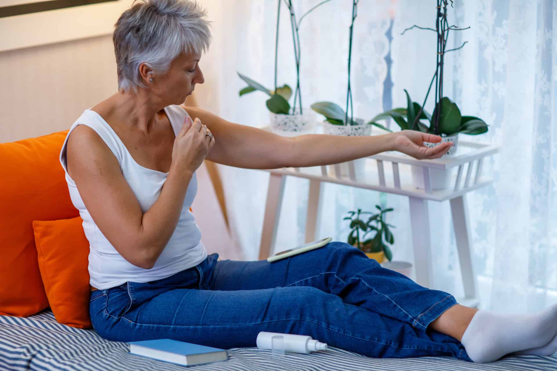  A woman administering topical hormone replacement 